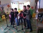 Shows photos of karaoke on children day celebrations